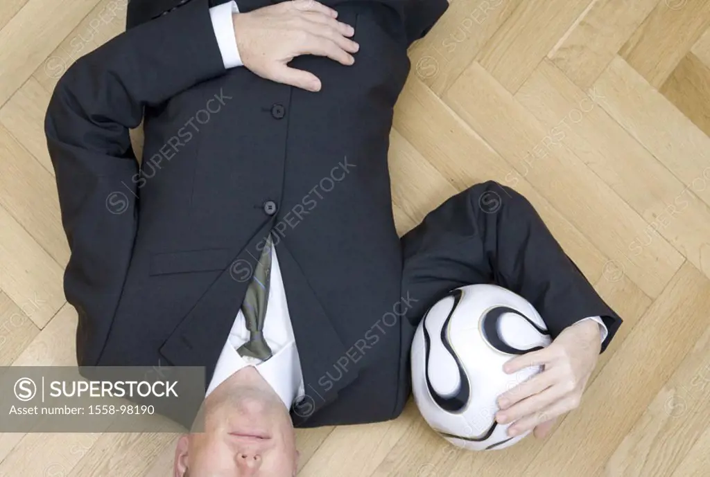 lie businessman, floor,  Football, holding, portrait, truncated,  from above, no property release,  Series, man, suit, ball, timber flooring, parquet ...