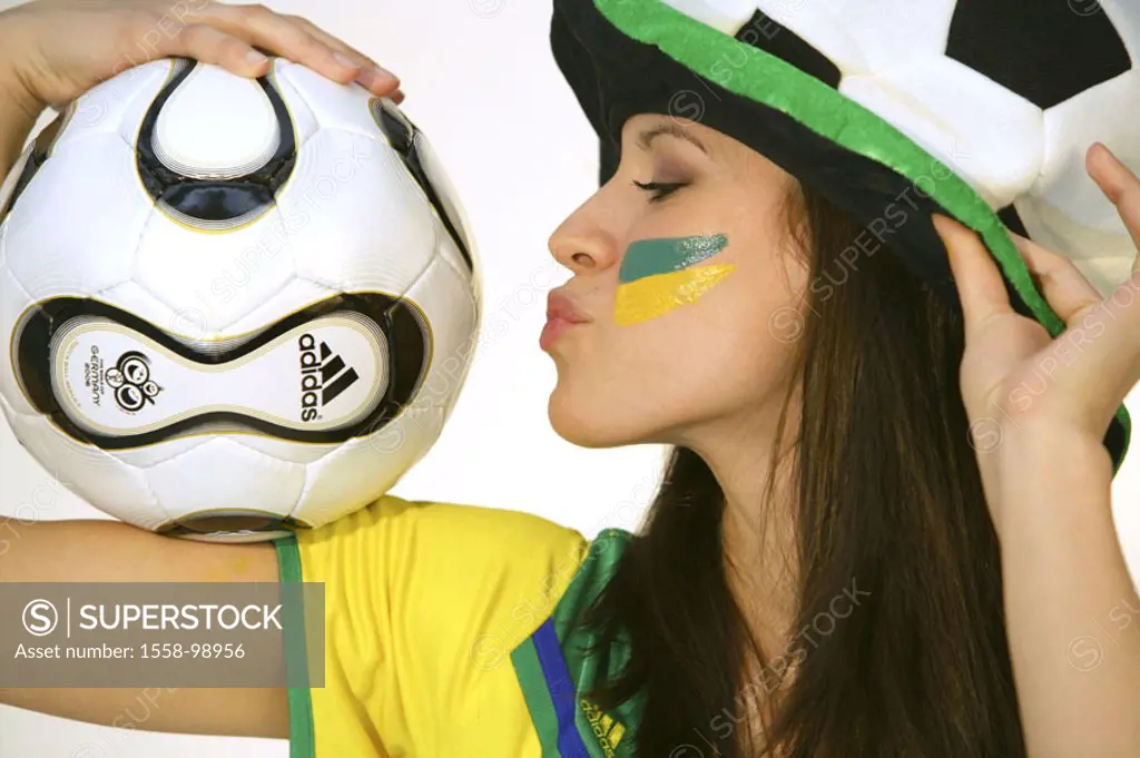 Woman, young, football fan, fan articles,  Ball, holding, kiss, profile,  no property release,  Series, 20-30 years, long-haired, brunette, nicely, ra...