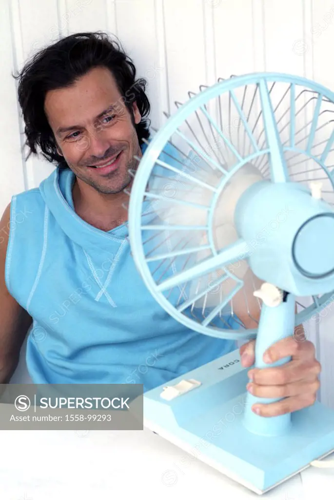Man, sitting, table ventilator, holding, Cooling,   30-40 years, dark-haired, top blue, sweat, heat, ventilator, refreshment, air circulation, smiling...