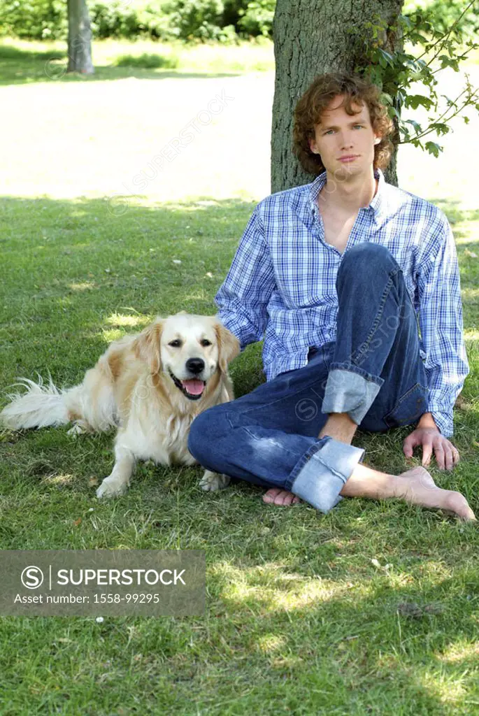 Park, man, young, sitting, dog,  caresses, summer,   20-30 years, leisurewear, jeans, nakedfoot, walk rest relaxation, relaxen, accompanying dog resti...
