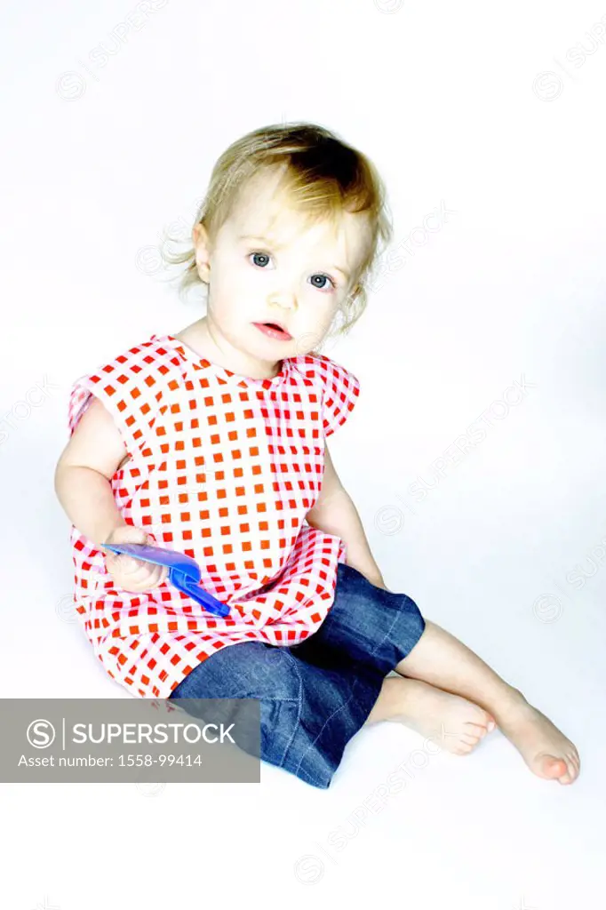 Floor, toddler, toy, sits,   Child, small, baby, girls, 1-3 years, blond, blouse checkered, cutely, interests, alertly, wakened, plays, sand shovel, s...