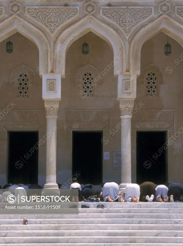 Egypt, Hurghada, Abd-el-Menaim-Rhiad Mosque, at the beginning of area, believers,  kneeling, prayer, view from behind,  Abd-el Moniem Reyad mosque, bu...