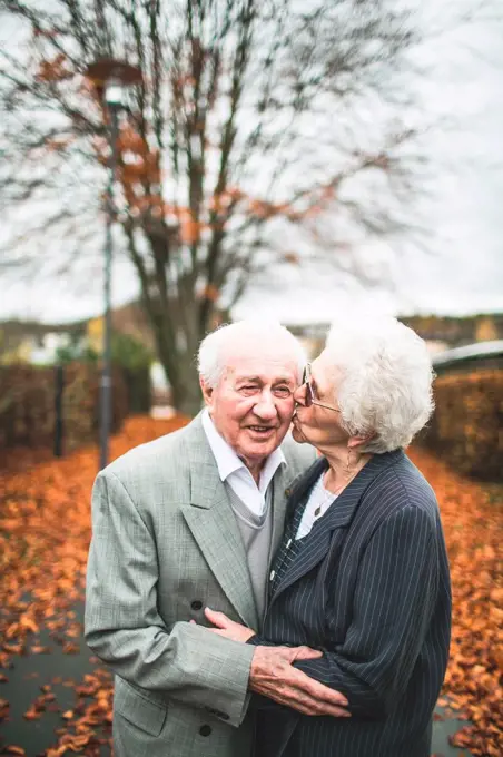 Senior couple in love at autumn walk