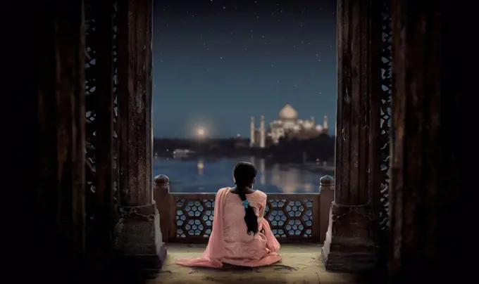 Woman looking at Taj Mahal, Agra, Uttar Pradesh, India, Asia