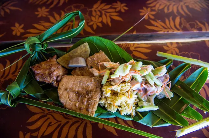 Local food served on a plam leave, Bora Bora, French Polynesia