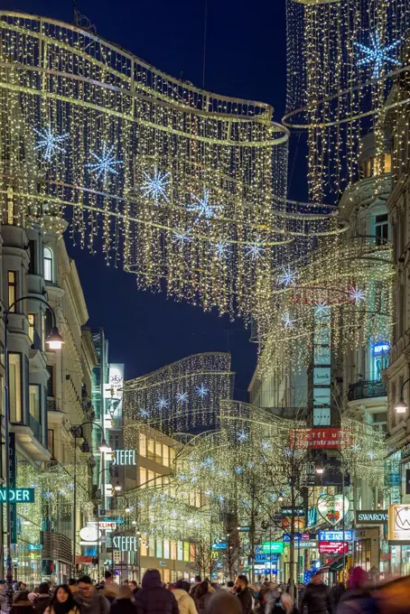 Austria, Vienna, Kartnerstrasse shopping street, Christmas decorations, evening
