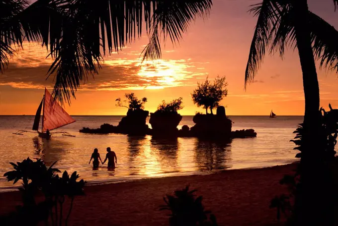 couple at sunset in Boracay, Philippines, Asia