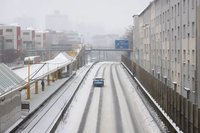 Essen, North Rhine-Westphalia, Germany - onset of winter in the Ruhr area, few cars drive on the A40 motorway in ice and snow.