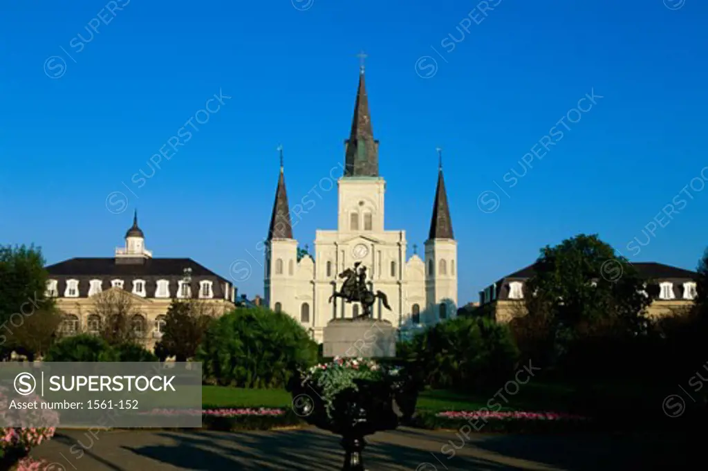 Statue in front of a cathedral, St. Louis Cathedral, Jackson Square, New Orleans, Louisiana, USA