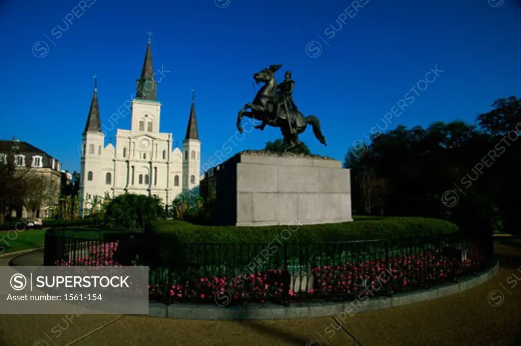 Low angle view of a statue in front of a cathedral, Andrew Jackson Statue, St. Louis Cathedral, New Orleans, Louisiana, USA