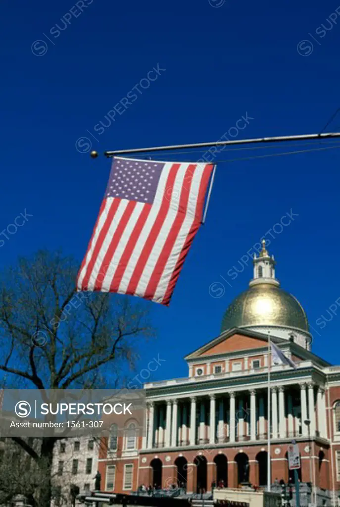 Low angle view of an American flag in front of a government building, State Capitol, Boston, Massachusetts, USA