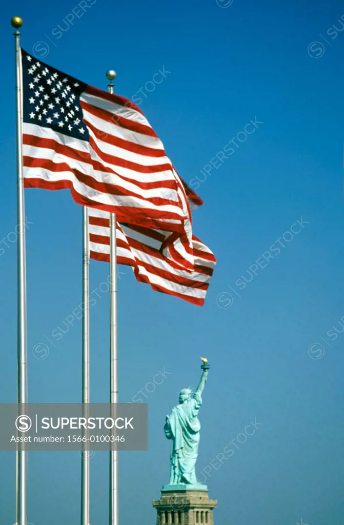 Statue of Liberty and US flags. New York City. USA
