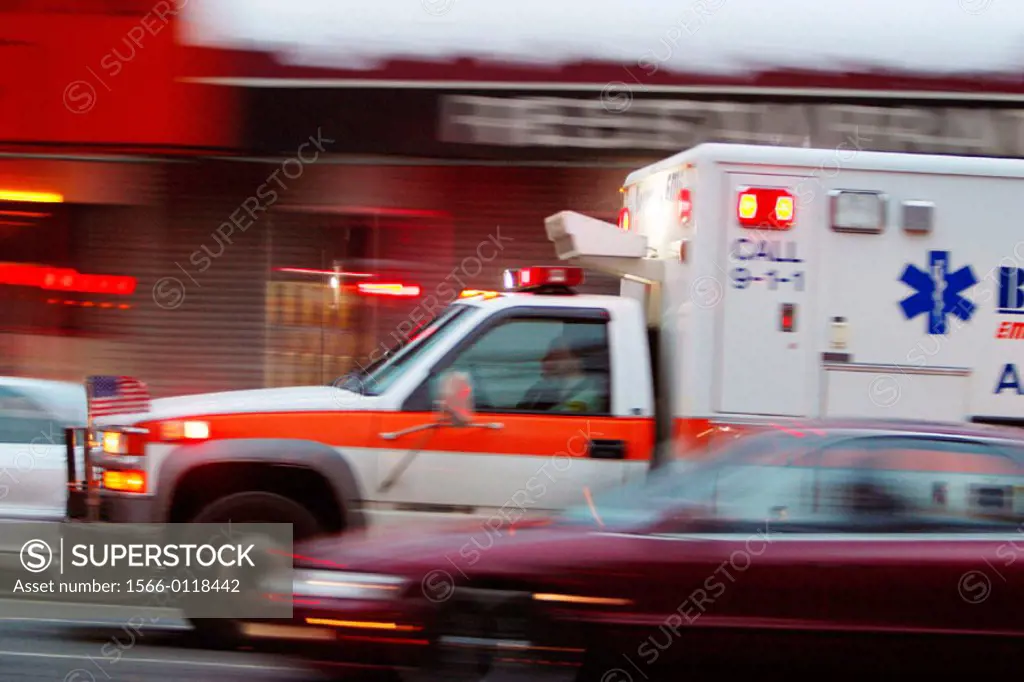 Ambulance racing through traffic. Boston. USA
