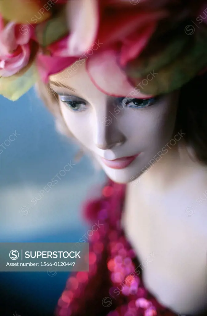 Mannequin with pink dress and hat