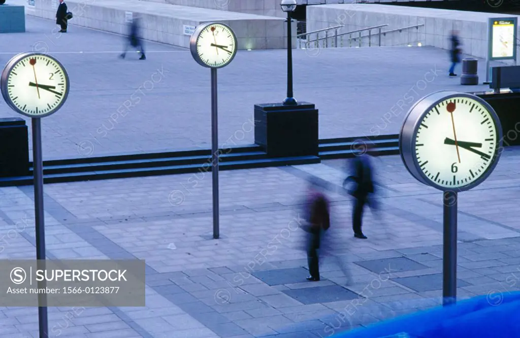 Docklands Plaza with giant clocks. London. England