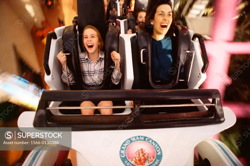 Mother and daughter on roller coaster