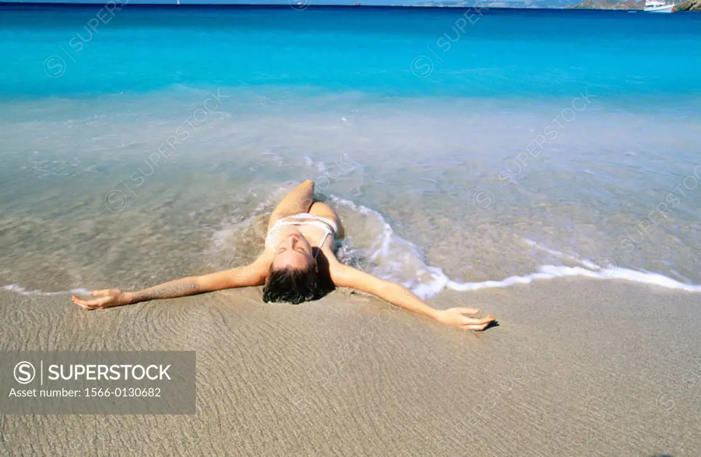 Saint Barthelemy, Caribbean, woman on beach at Colombier Bay