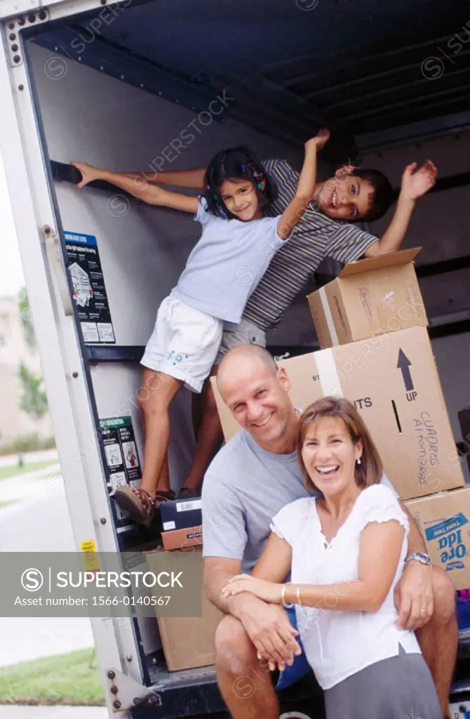 Family by moving truck