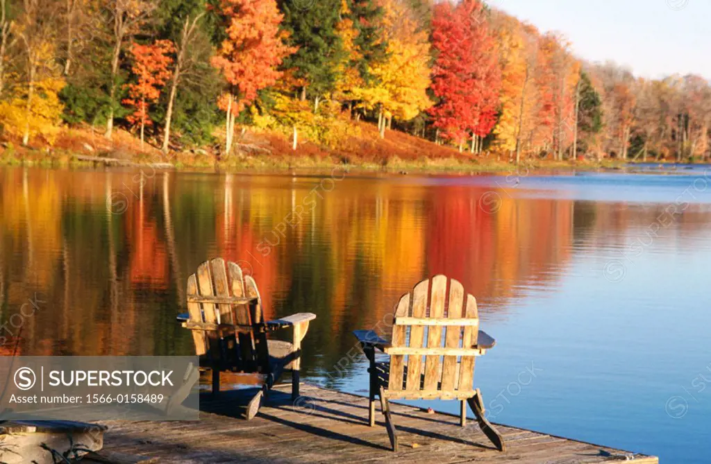 Adirondack chairs in a dock in autumn. Starlight. Pennsylvania. USA