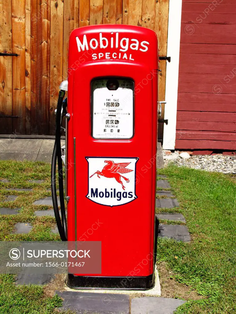 Gas pump in yard in Shelburne Falls. Massachusetts, USA