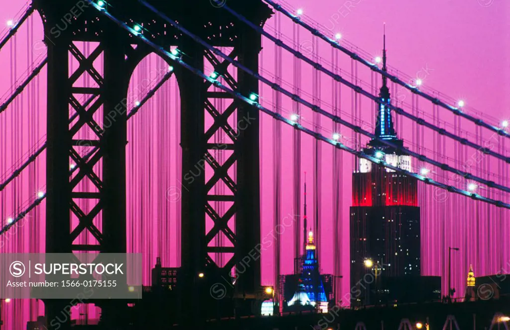 Manhattan Bridge and Empire State Building at night. New York City, USA