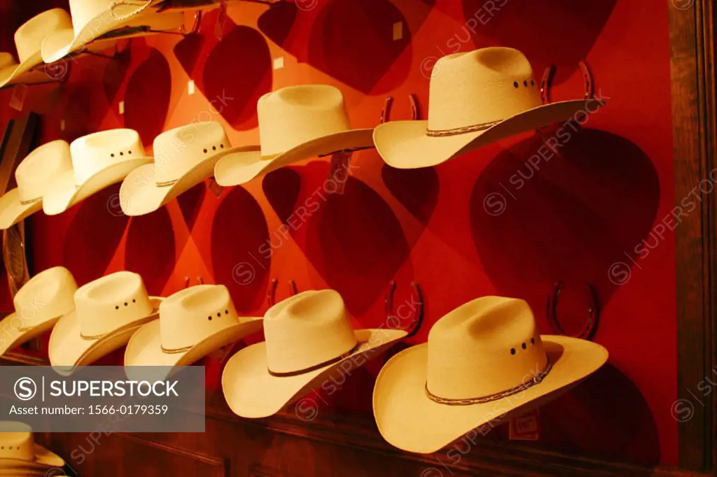 Display of straw Stetson cowboy hats in a Western store in Dallas, Texas