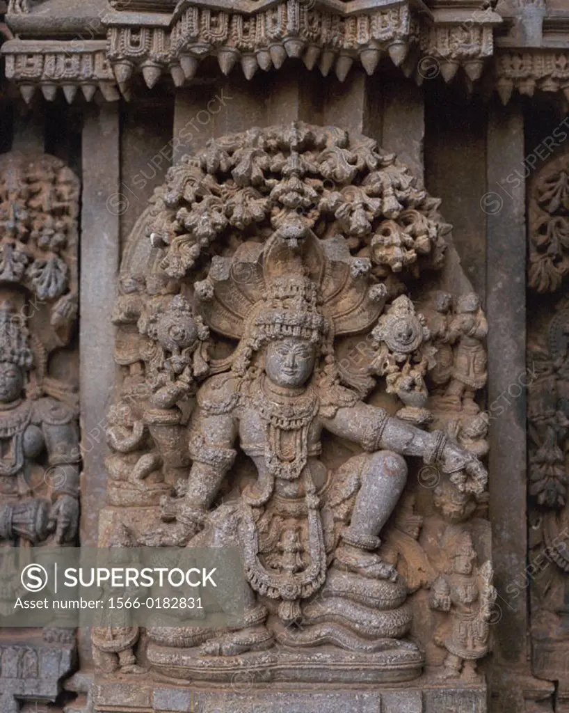 Carved image of Vishnu seated on serpent Adisesha. Chennakeshava Temple. Somnathpur. India
