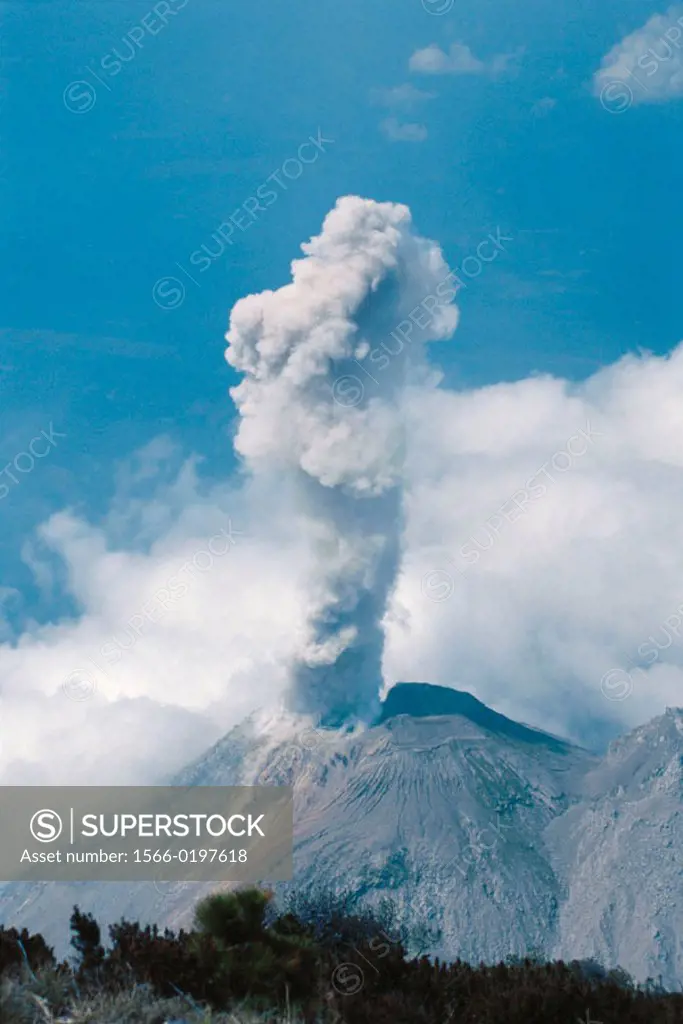 Volcan Santiaguito erupting as seen from the summit of nearby Volcan Santa María, above Quetzaltenango (Xela), Guatemala.