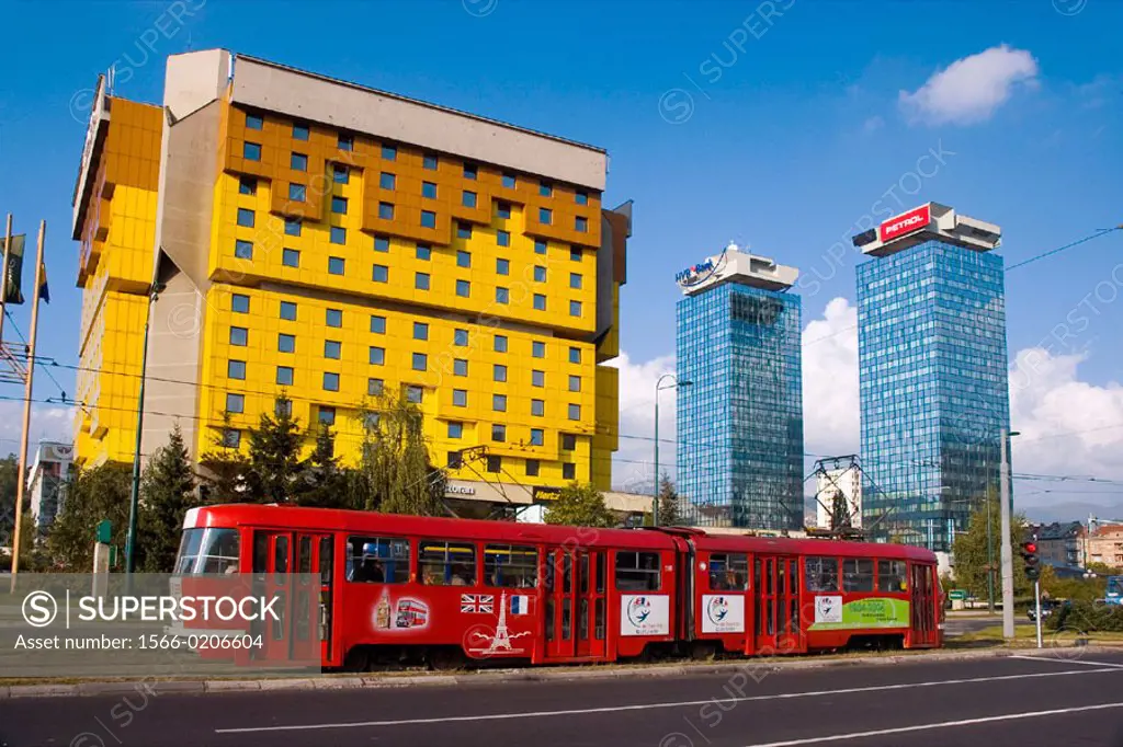 Bosnia-Hercegovina, Sarajevo, Holiday Inn and red tram on Sniper´s Alley