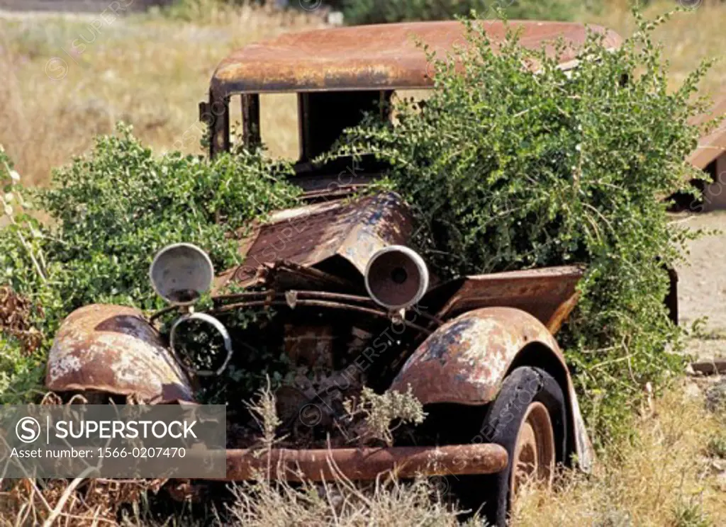 Oldtimer car rusting away, Cabo de Gata, Spain