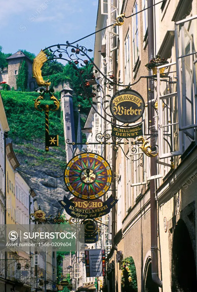 Antique wrought iron signs in Getreidegasse pedestrian street. Salzburg. Austria