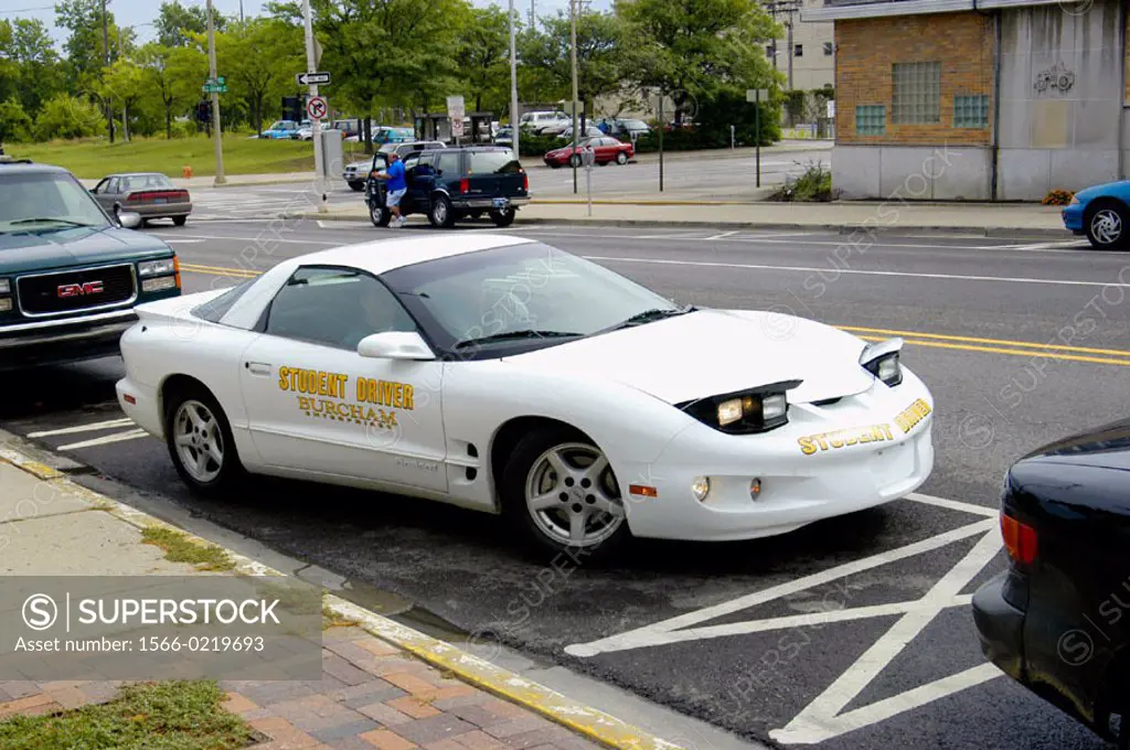 Student driver learns to parallel park. Lansing, Michigan. USA