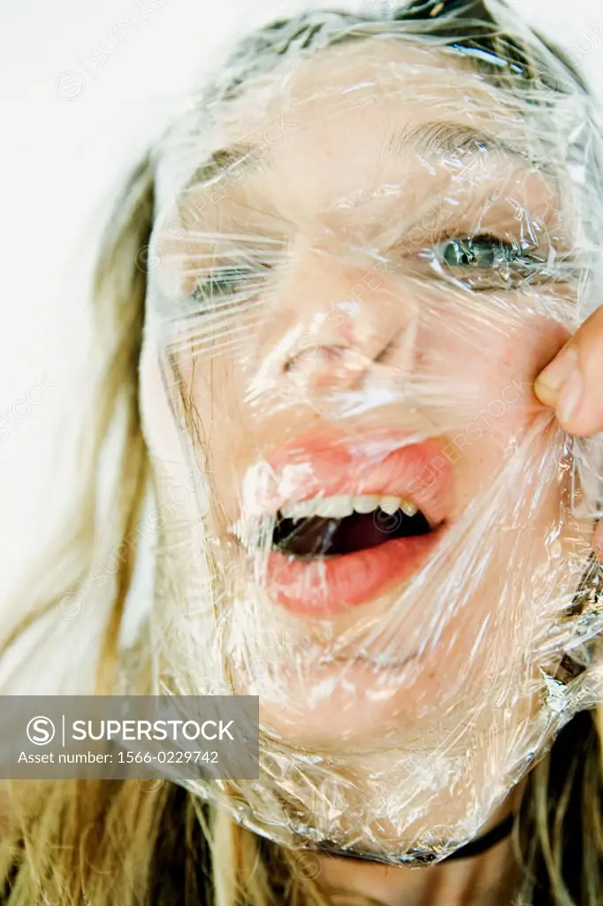 Woman with plastic on her face