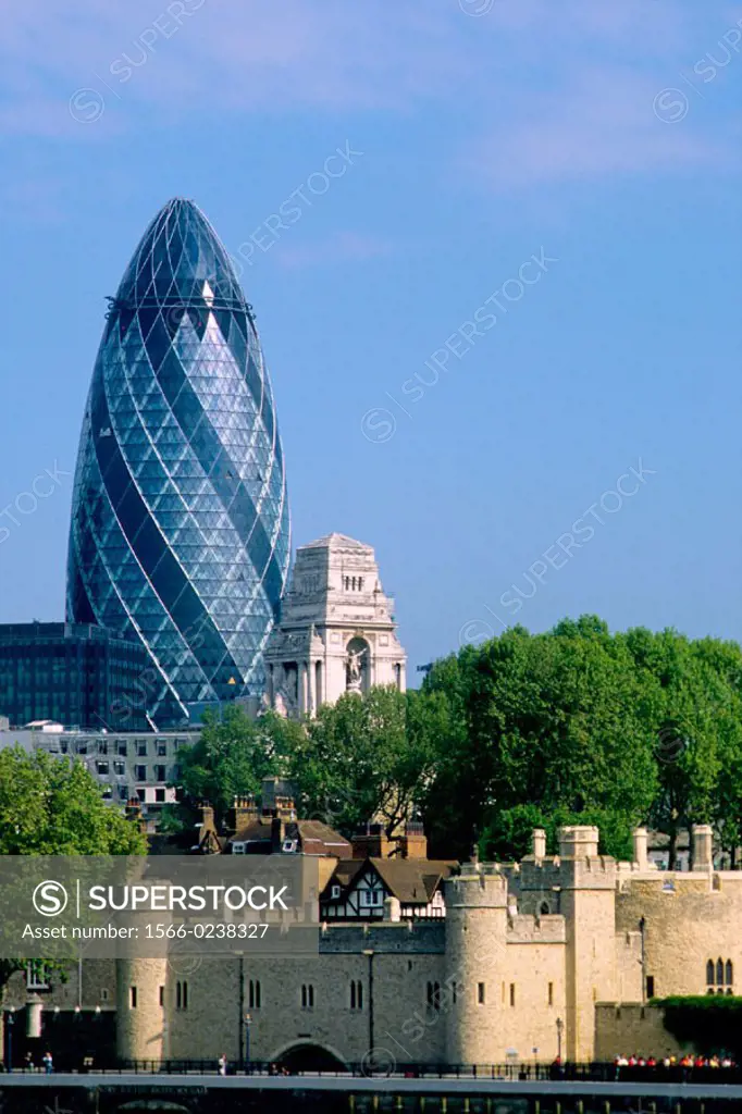 Swiss re headquarters an Tower of London. City skyline. London. England. UK.