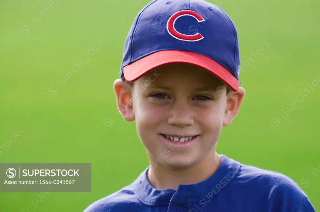 Boy with baseball uniform