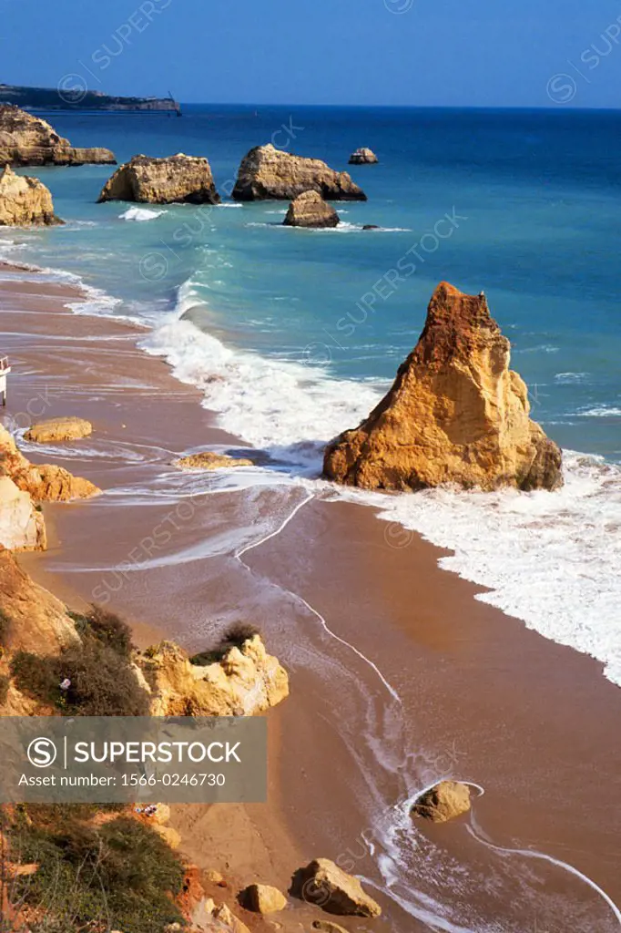 Beach, cliffs. Praia da Rocha. Algarve. Portugal.