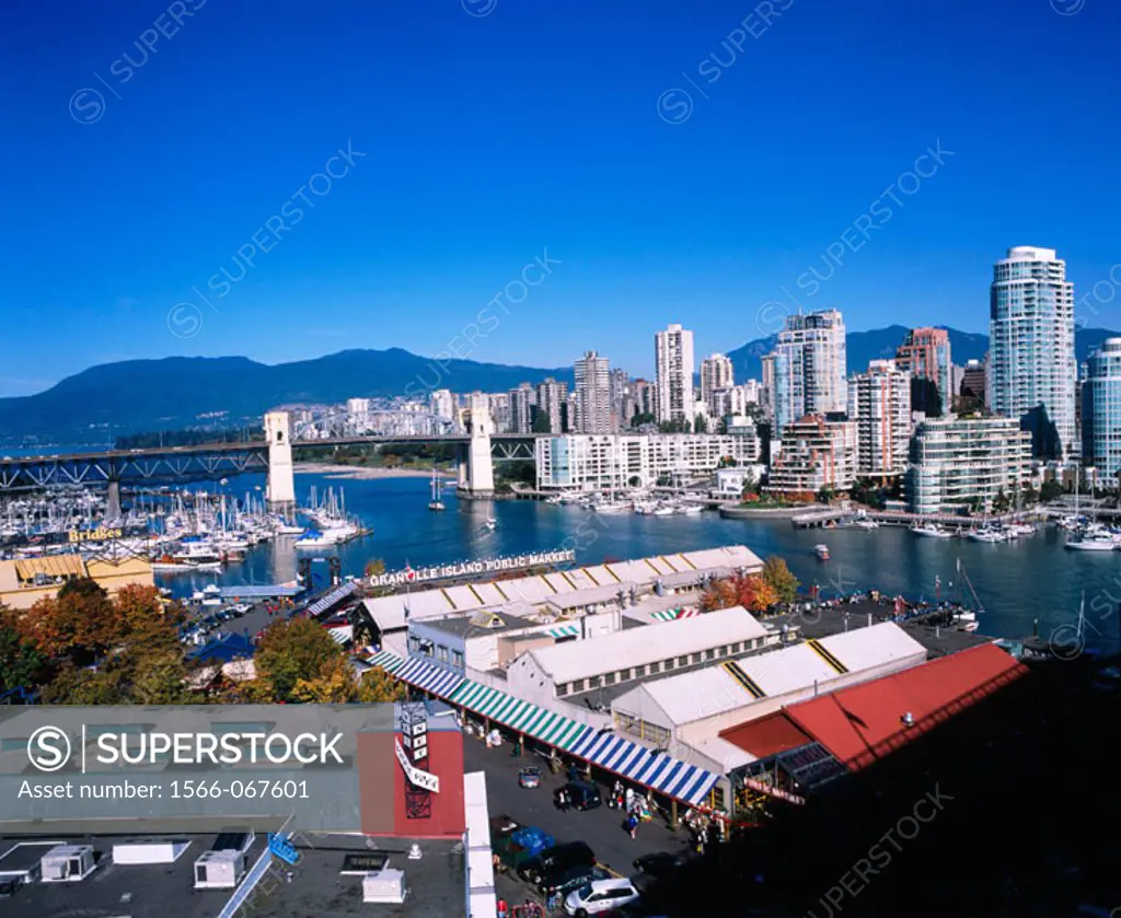 Markets, false creek, burrard bridge and city skyline. Granville island. Vancouver. British Columbia. Canada