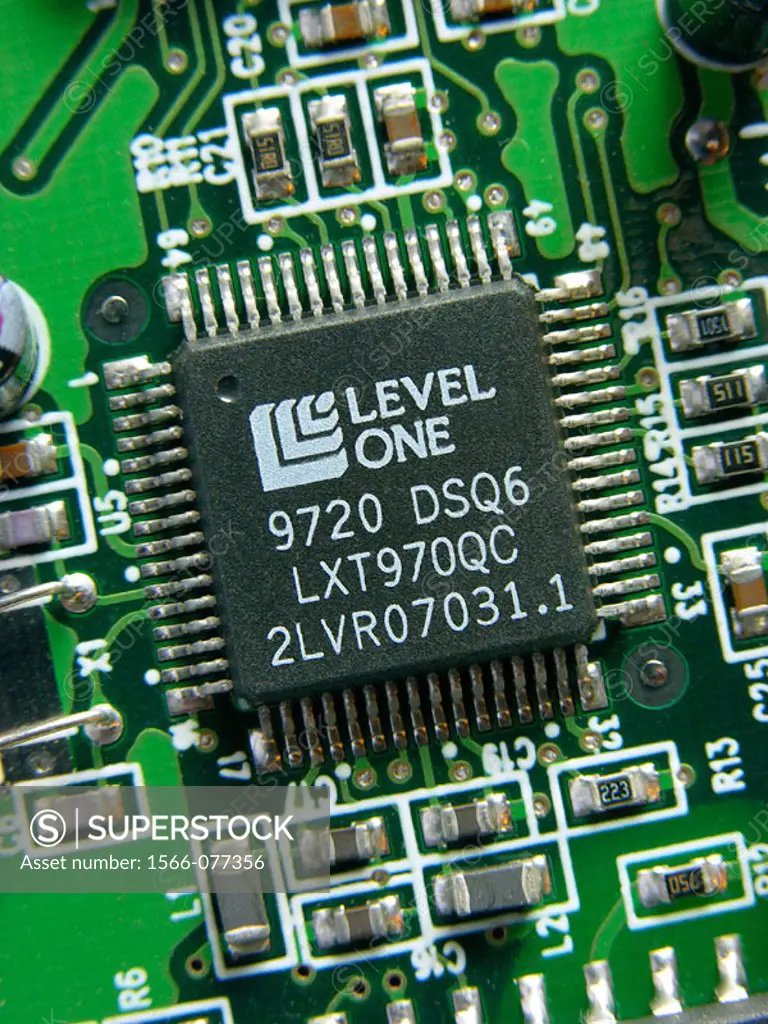 Detail of a PCI Ethernet Network controller card showing a fast ethernet transceiver (Level One LXT790QC),
