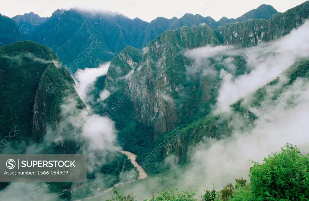 Clouds filling the Urubamba River Valley beneath the Machu Picchu. Peru