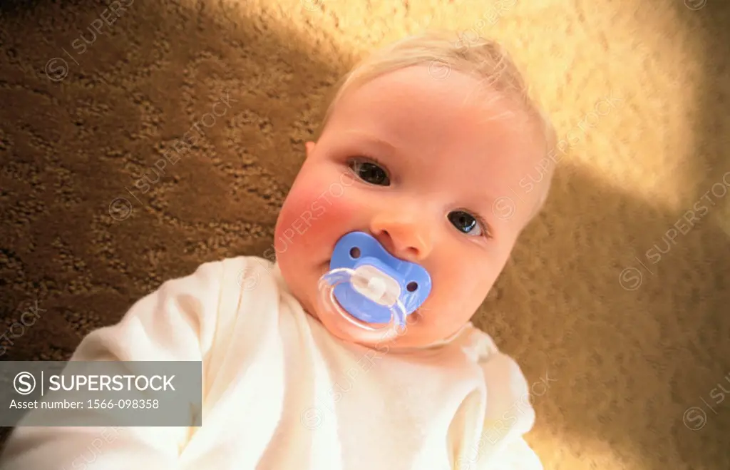 Infant with pacifier