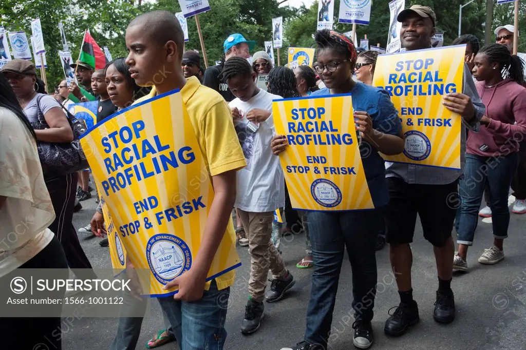 Thousands of demonstrators march down Fifth Avenue in New York for a silent march protesting the NYPD policy of stop and frisk The participants say th...