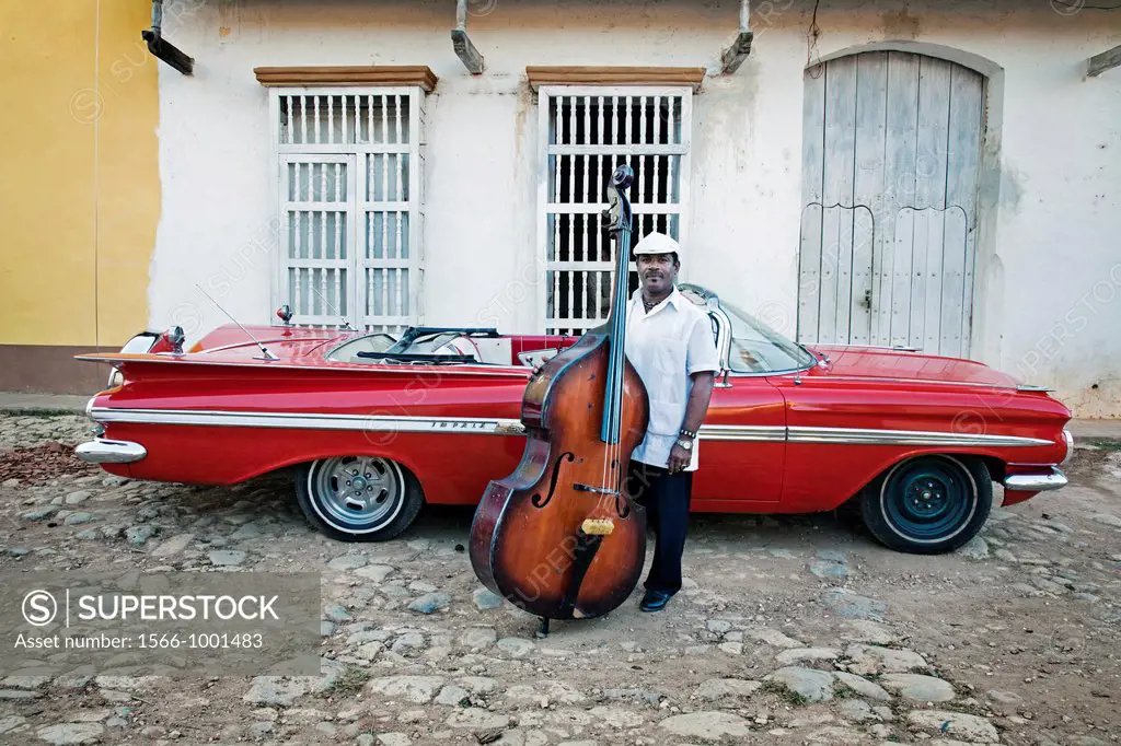 Classic car and music band , Trinidad city, Sancti Spiritus Province, Cuba.