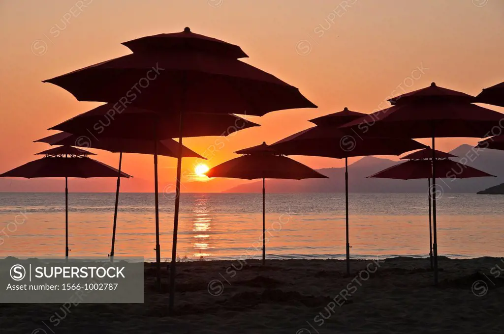 Sunset across the Messinian Gulf at Kalogria beach, Stoupa, in the Outer Mani, Southern Peloponnese, Greece