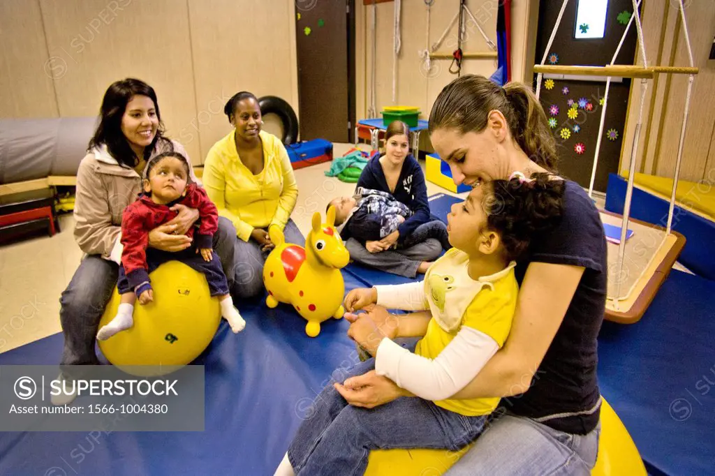 Teachers comfort disoriented vision-impaired children in a sensory motor group at the Blind Children´s Learning Center in Santa Ana, CA