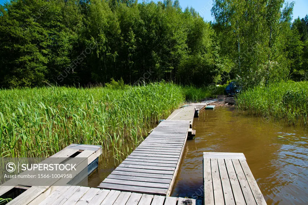 Wooden pier along Porvoonjoki river Porvoo Uusimaa province Finland northern Europe