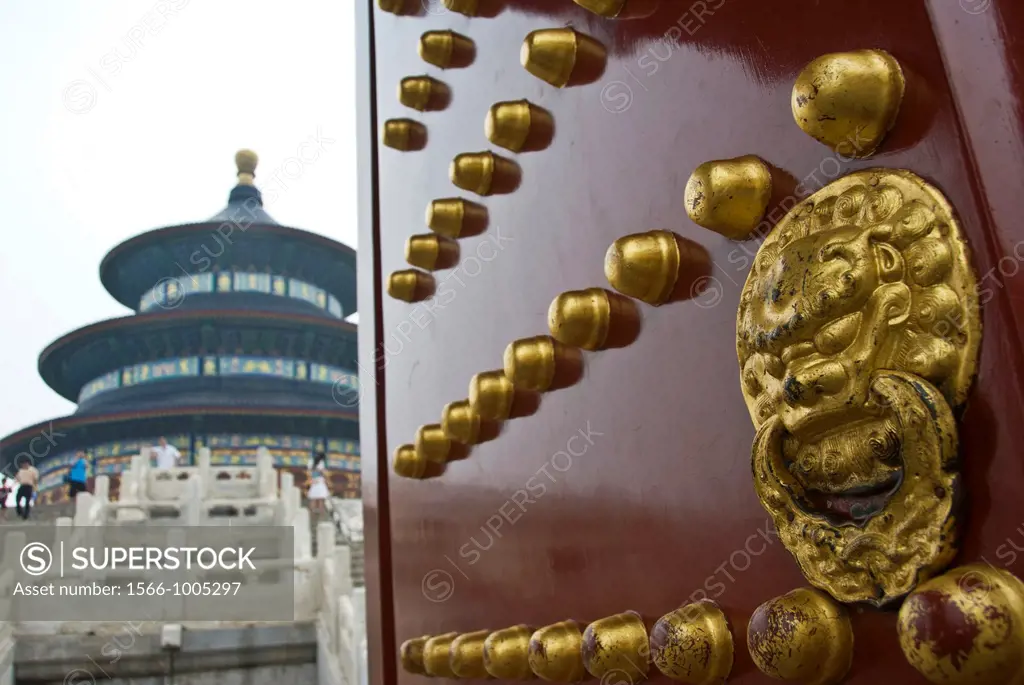 Door at the Temple of heaven with view of the Hall of Prayer for Good Harvests, Beijing, China.