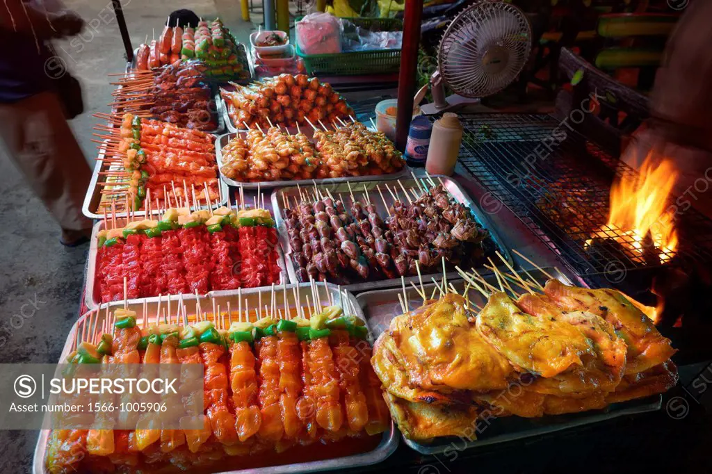 Thailand - Phuket Island, Patong Beach, street stall with meat skewers ready to grill