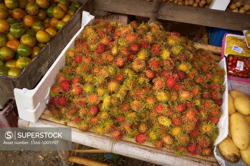 Thailand - Phuket Island, Patong Beach, street stall with rambutan fruits