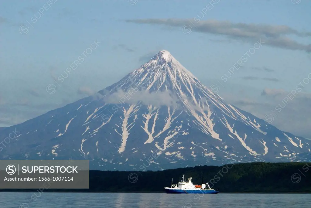 The Spirit of Enderby, an expedition cruising vessel anchored below Kronotskaya Volcano, Kronotsky Nature Reserve, Kamchatka, Russian Far East  Volcan...