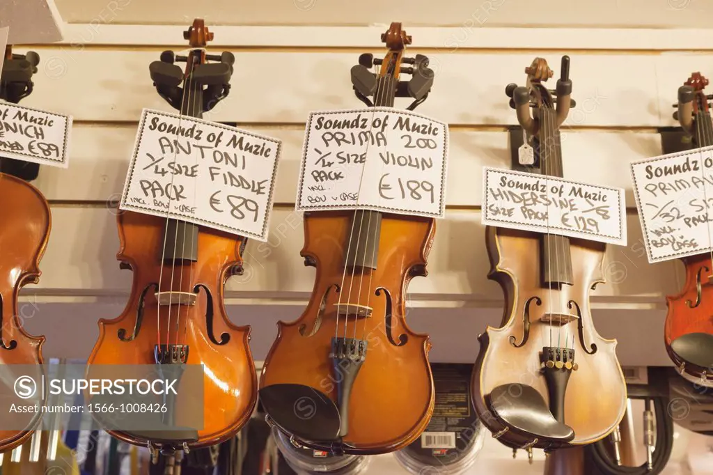Kenmare, County Kerry, Ireland  Violins for sale in music shop